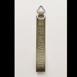 NWT FP MOVEMENT BY FREE PEOPLE THERE IT IS KEYRING